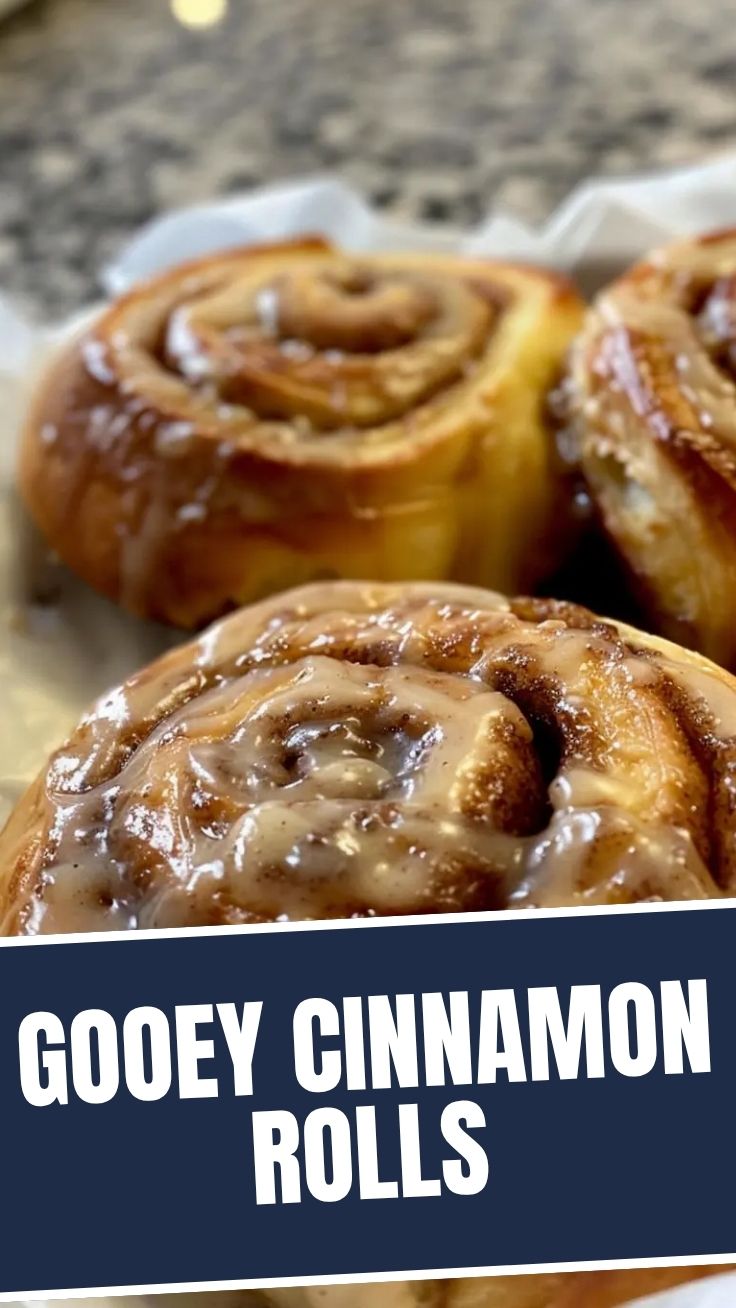 Homemade cinnamon rolls resting in a warm oven